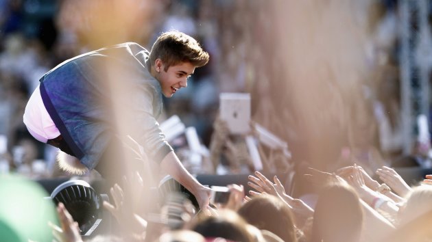 Singer Bieber interacts with fans as he speaks on stage to introduce singer Carly Rae Jepsen at the 2012 Wango Tango concert at the Home Depot Center in Carson