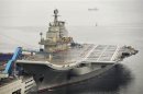 File photo of China's first aircraft carrier at Dalian Port in Liaoning province