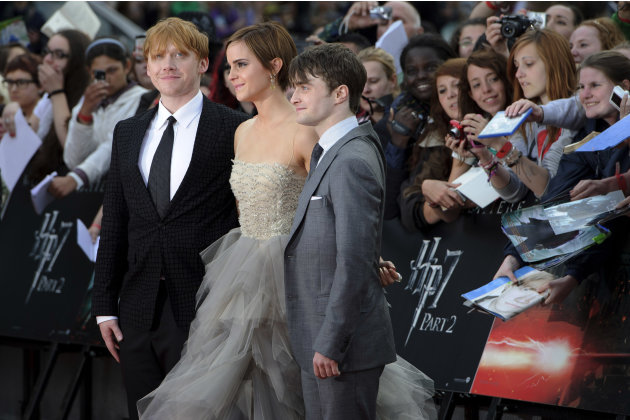 British actors, Rupert Grint, Emma Watson and Daniel Radcliffe arrive in Trafalgar Square, central London, for the World Premiere of 