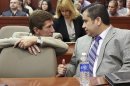 George Zimmerman, right, speaks with defense attorney Mark O'Mara during his trial in Seminole circuit court in Sanford, Fla. Thursday, June 27, 2013. Zimmerman has been charged with second-degree murder for the 2012 shooting death of Trayvon Martin. (AP Photo/Orlando Sentinel, Jacob Langston, Pool)