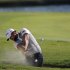 Moore of the U.S. hits from the fairway bunker on the 17th hole during the third round of the Tour Championship golf tournament in Atlanta