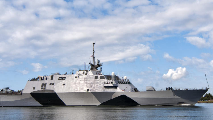 In this photo provided by the U.S. Navy, the USS Freedom littoral combat ship pulls into Pearl Harbor, Hawaii. The USS Freedom, which  is stopping in Hawaii on its way to a deployment to Singapore, has advantages bigger U.S. Navy ships lack. (AP Photo/US Navy, Mass Communication Specialist 2nd Class Sean Furey)