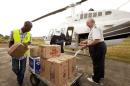 Samaritan's Purse team members help with the delivery of supplies in Liberia in this undated handout photo