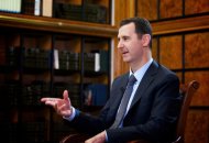Syrian President Bashar al-Assad answers questions during an interview with Russian television Rossiya 24 in Damascus, on September 12, 2013