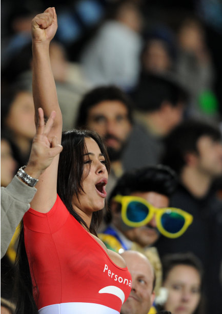 Paraguayan supporter Larissa Riquelme celebrates during the penalty shoot-out against Brazil during a 2011 Copa America quarter-final football match held at the Ciudad de La Plata stadium in La Plata, 59 Km south of Buenos Aires, on July 17, 2011. Brazil missed three of its shots and Paraguayan goalkeeper Justo Villar stopped another, giving Paraguay a 2-0 win. AFP PHOTO / ANTONIO SCORZA (Photo credit should read ANTONIO SCORZA/AFP/Getty Images)