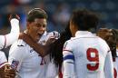 Trinidad and Tobago defender Lauren Hutchinson (20) reacts after her tying goal against Costa Rica in the second half during a CONCACAF semifinal soccer match in Philadelphia, Pa., Friday, Oct. 24, 2014. (AP Photo/Rich Schultz)