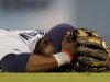 San Diego Padres second baseman Orlando Hudson reacts after letting a single by Los Angeles Dodgers' Andre Ethier get by during the sixth inning of a baseball game in Los Angeles, Monday, Aug. 29, 2011. (AP Photo/Chris Carlson)