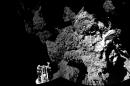 The combination photo of different images taken with the CIVA camera system released by the European Space Agency ESA on Thursday Nov. 13, 2014 shows Rosetta's lander Philae as it is safely on the surface of Comet 67P/Churyumov-Gerasimenko, as these first CIVA images confirm. One of the lander's three feet can be seen in the foreground. Philae became the first spacecraft to land on a comet when it touched down Wednesday on the comet, 67P/Churyumov-Gerasimenko. (AP Photo/Esa/Rosetta/Philae)