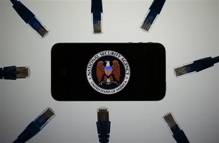 An illustration picture shows the logo of the U.S. National Security Agency on the display of an iPhone in Berlin, June 7, 2013. REUTERS/Pawel Kopczynski