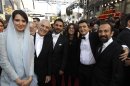 From left, Leila Hatami, Mahmoud Kalari, Peyman Moadi, Sarina Farhadi, Thomas Langmann, and Asghar Farhadi arrive before the 84th Academy Awards on Sunday, Feb. 26, 2012, in the Hollywood section of Los Angeles. (AP Photo/Chris Carlson)