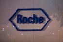 The logo of Swiss pharmaceutical company Roche is seen outside the Shanghai Roche Pharmaceutical Co. Ltd. headquarters in Shanghai