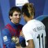 Messi of Spain's Barcelona is greeted by Neymar of Brazil's Santos after their Club World Cup final soccer match in Yokohama