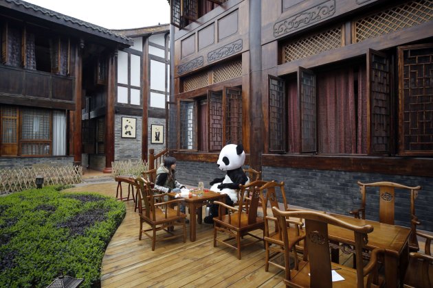 An employee dressed in a panda …