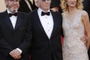 Producer Albert Berger, left, actor Bruce Dern and his daughter actress Laura Dern arrive for the screening of Nebraska at Cannes (AP)