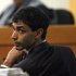 Dharun Ravi turns to look behind him during his trial in New Brunswick, N.J., Tuesday, Feb. 28, 2012. Ravi is accused of using a webcam to spy on his roommate, Tyler Clementi, during an intimate encounter with another man. Days later Clementi committed suicide. Ravi, 19, faces 15 criminal charges, including invasion of privacy and bias intimidation, a hate crime punishable by up to 10 years in state prison. (AP Photo/The Courier-News, Kathy Johnson, Pool)