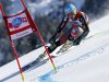 Ted Ligety of the United States  skies down to the slope of the men's Alpine ski World Cup giant slalom first run at the World Cup final in Lenzerheide, Switzerland, Saturday, March 16,  2013. (AP Photo/Alessandro Trovati)