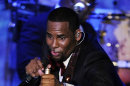 In this Feb. 12, 2011 photo, R. Kelly performs at the pre-Grammy gala & salute in Beverly Hills, Calif. The outrageous musical series started off as five videos for the R&B singer's dramatic cliffhanger songs in 2007. It quickly became a cult classic and he added more chapters and put the accompanying videos on a DVD also teamed up with IFC to premiere it. (AP Photo/Mark J. Terrill)