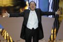 Billy Crystal performs during the 84th Academy Awards on Sunday, Feb. 26, 2012, in the Hollywood section of Los Angeles. (AP Photo/Mark J. Terrill)