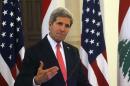 U.S. Secretary of State John Kerry gestures as he speaks during a news conference after meeting with Lebanon's Prime Minister Tammam Salam at the government palace in Beirut