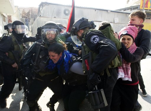 Foreign activists scuffle with Israeli security forces during clashes near Ramallah