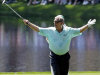 Fuzzy Zoeller acknowledges applauds after putting on the eighth hole during the par three competition before the Masters golf tournament Wednesday, April 10, 2013, in Augusta, Ga. (AP Photo/Charlie Riedel)