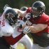Atlanta Falcons offensive tackle Sam Baker, right, blocks defensive end John Abraham (55) during their NFL football training camp workout in Flowery Branch, Ga., Monday, Aug. 1, 2011. (AP Photo/John Bazemore)