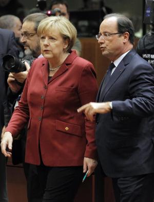 German Chancellor Angela Merkel, left, and French President …