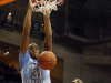 North Carolina's John Henson (31) dunks over Miami's Raphael Akpejiori (10) during the first half of an NCAA college basketball game, Wednesday, Feb. 15, 2012, in Coral Gables, Fla. (AP Photo/Lynne Sladky)