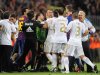 Real Madrid and FC Barcelona players argue during their Super Cup final second leg soccer match at the Camp Nou Stadium in Barcelona, Spain, Wednesday, Aug. 17, 2011. (AP Photo/Manu Fernandez)