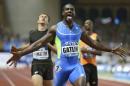 FILE - In this July 18, 2014, file photo, Justin Gatlin, of United States, wins the men's 200-meter event at the Herculis International Athletics Meet at the Louis II Stadium in Monaco. Gatlin isn't all that concerned with winning a popularity contest, only races. Still, the American sprinter doesn't quite understand the backlash over his nomination for athlete of the year after a season in which he went 18-0 in the 100 and 200. (AP Photo/Lionel Cironneau, File)