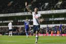 Tottenham's Harry Kane celebrates after scoring a penalty to equalise during the English FA Cup third round soccer match between Tottenham Hotspur and Leicester City at White Hart Lane in London, Sunday Jan. 10, 2016. (AP Photo/Tim Ireland)