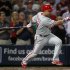 Philadelphia Phillies' Placido Polanco drives  in a run with a base hit in the fourth inning of a baseball game against the Braves  in Atlanta Monday, Sept. 26, 2011 in Atlanta.   (AP Photo/John Bazemore)