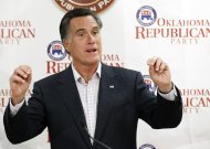 Republican presidential candidate former Massachusetts Gov. Mitt Romney, gestures as he speaks to supporters at Oklahoma state Republican Party Headquarters in Oklahoma City, Wednesday, May 9, 2012. Romney repeated his view that marriage should be restricted to one man and one woman, highlighting a sharp contrast with President Barack Obama. (AP Photo/Sue Ogrocki)
