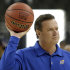 Kansas head coach Bill Self passes a ball during a practice session for the NCAA Final Four basketball tournament Friday, March 30, 2012, in New Orleans. Kansas plays Ohio State in a semifinal game on Saturday. (AP Photo/David J. Phillip)