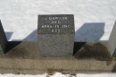 This Feb. 29, 2012 photo shows the headstone of Joseph Dawson, who shoveled coal aboard the Titanic, at the Fairview Lawn Cemetery in Halifax, Nova Scotia, Canada. The inscription 