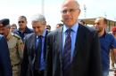 Britain's Ambassador to Libya, Michael Aron, arrives at Mitiga International Airport on June 10, 2014