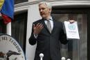 WikiLeaks founder Julian Assange makes a speech from the balcony of the Ecuadorian Embassy, in central London