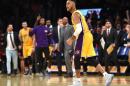 Lakers shoot down Rockets to launch new era