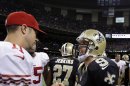 New Orleans Saints quarterback Drew Brees (9) shakes hands with San Francisco 49ers quarterback Alex Smith (11) after an NFL football game in New Orleans, Sunday, Nov. 25, 2012. The 49ers won 31-21. (AP Photo/Bill Haber)