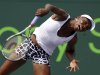 Venus Williams returns to Aleksandra Wozniak, of Canada, during the Sony Ericsson Open tennis tournament in Key Biscayne, Fla., Sunday, March 25, 2012. (AP Photo/Alan Diaz)