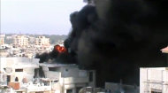 This image made from amateur video released by Shaam News Network and accessed by the Associated Press Saturday, July 21, 2012 purports to show the spread of fires as a result of the shelling of Homs, Syria by government forces on July 21, 2012. (AP Photo/Shaam News Network via AP video) IMAGE MADE FROM AMATEUR VIDEO RELEASED BY SHAAM NEWS NETWORK AND ACCESSED VIA AP VIDEO SATURDAY, JULY 21, 2012. THE ASSOCIATED PRESS CANNOT INDEPENDENTLY VERIFY THE CONTENT, DATE, LOCATION OR AUTHENTICITY OF THIS MATERIAL.