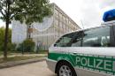 A police car is parked in the district of Hellersdorf-Marzahn in Berlin on August 21, 2013