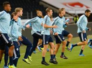 Germany players take part in a training session on October 14, 2013, the eve of their World Cup qualifier against Sweden in Solna