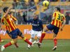 Inter Milan's Snijder fights for the ball with Lecce's Miglionico and Oddo during their Italian Serie A soccer match in Lecce