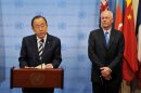 Ban Ki-Moon (L) speaks to the media with Ake Sellstrom (R) on September 16, 2013 at UN headquarters in New York