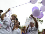 Cindy Anthony, second from left, and George Anthony, second from right, wipe away tears during a memorial ceremony at the site where the body of their granddaughter Caylee Anthony was found on what ...