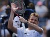 Mardy Fish celebrates after beating Tobias Kamke of germany 6-2, 6-2, 6-1, during the first round of the U.S. Open tennis tournament in New York, Monday, Aug. 29, 2011. (AP Photo/Mike Groll)