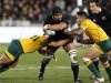 Victor Vito of New Zealand's All Blacks is tackled by Anthony Fainga'a and Digby Ioane of Australia's Wallabies' in their Bledisloe Cup rugby union test match in Auckland