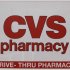 A CVS pharmacy sign is displayed outside a store in Foxborough, Mass., Feb. 7, 2012. CVS Caremark said Wednesday, Feb. 8, 2012, its fourth-quarter earnings climbed nearly 4 percent, as the drugstore operator’s pharmacy services revenue swelled due to a long-term contract and new business. (AP Photo/Stephan Savoia)