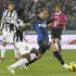 Inter Milan's Rodrigo Palacio scores past Juventus' Kwadwo Asamoah during their Italian Serie A soccer match at the Juventus stadium in Turin